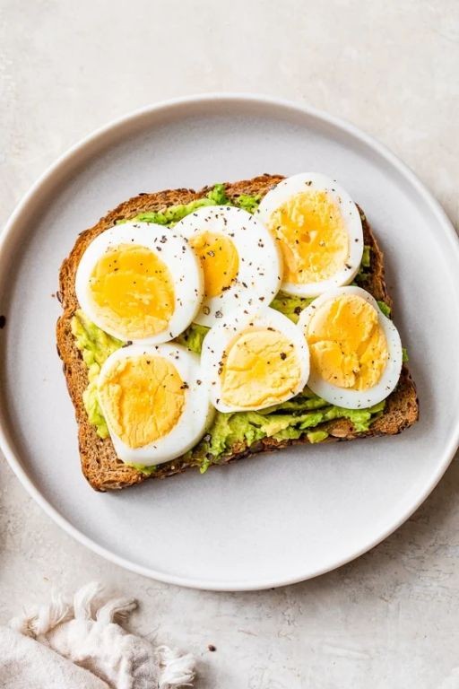 Avocado and Egg Toast on Whole Grain Bread