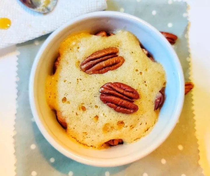 Butter Pecan Mug Cake with Walnut Topping