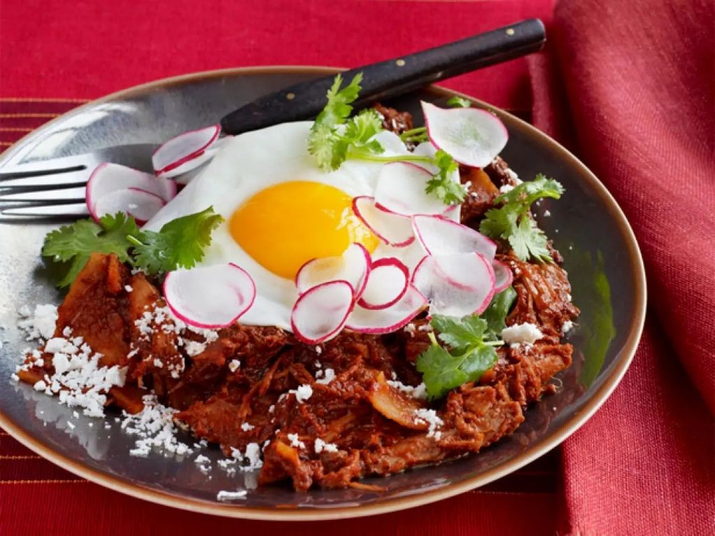 Chicken Thigh Chilaquiles with Fried Eggs