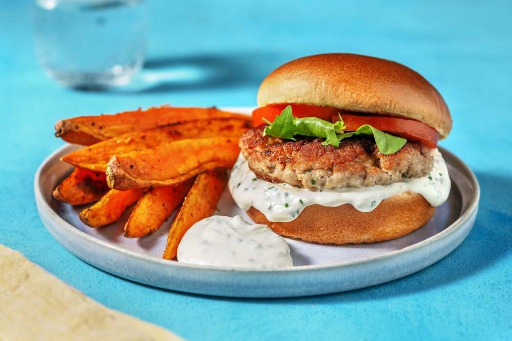 Classic Grilled Chicken Burger with Lettuce and Tomato