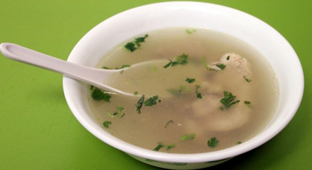 Clear chicken broth with ginger