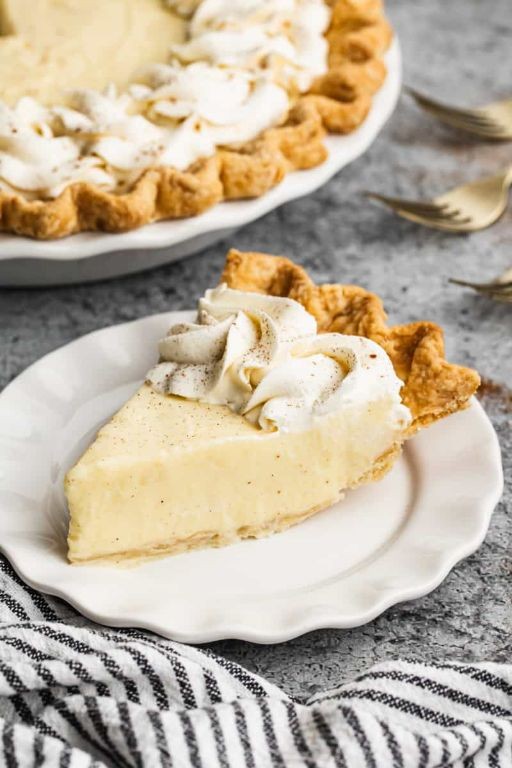 Eggnog Custard Pie with Whipped Cream