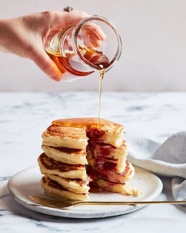 Fluffy Raspberry Pancakes with Maple Syrup