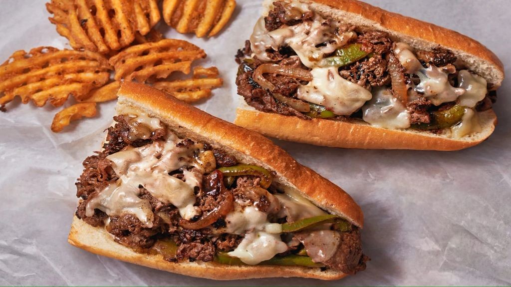 Griddled Philly Cheesesteak with Peppers and Onions