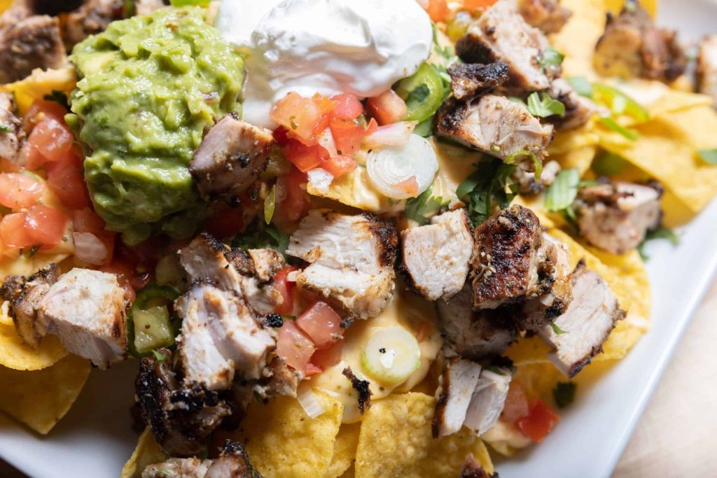 Jerk Chicken Nachos with Black Beans and Cheese