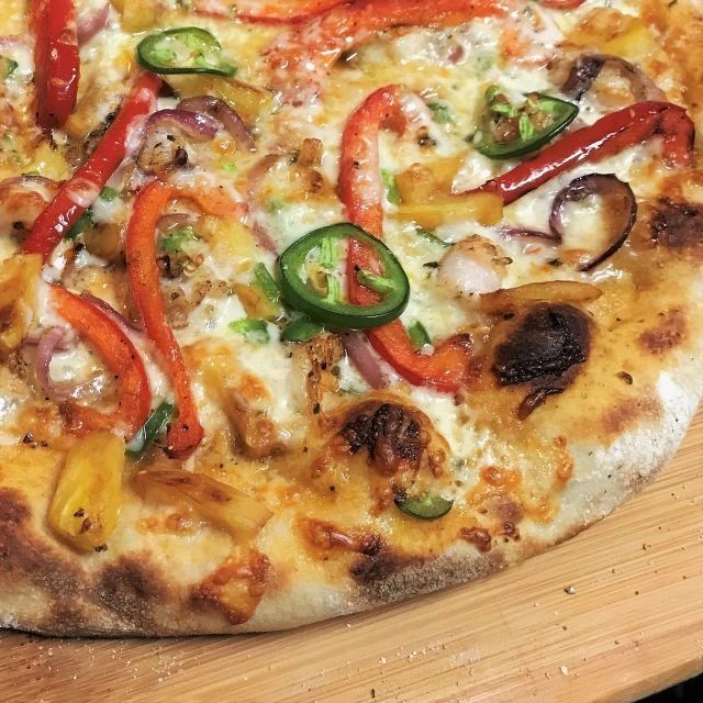 Jerk Chicken Pizza with Caramelized Onions