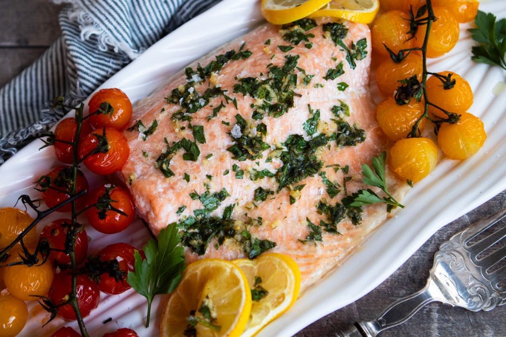 Lactation-boosting garlic and herb roasted salmon