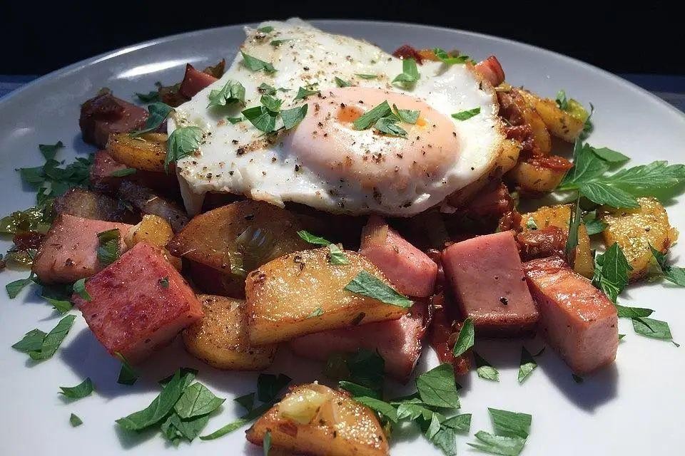 Leberkäse with Fried Eggs and Pickles