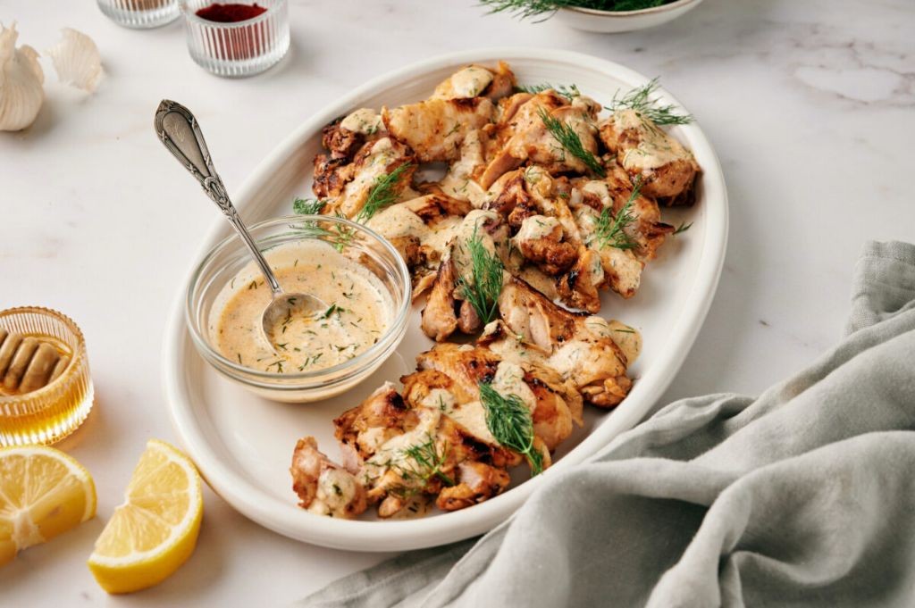 Lemon Pepper Chicken Fondue with Dill Yogurt Dip