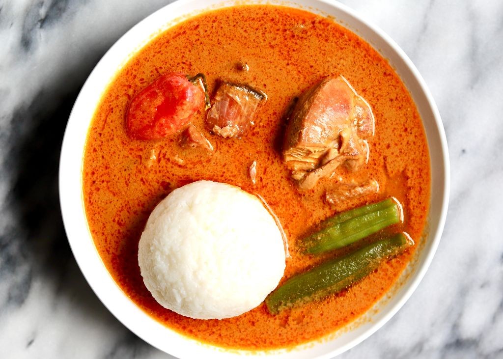 Omo Tuo (Rice Balls with Groundnut Soup)