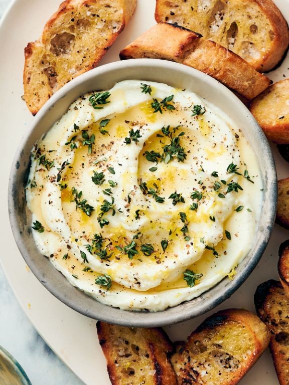 Parmesan crisps with whipped ricotta and honey