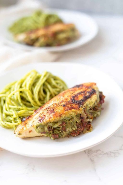 Pesto Stuffed Baked Chicken Breast with Sun-Dried Tomato Sauce