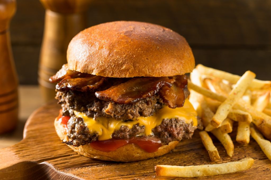 Pit Boss Griddle Smash Burgers with Caramelized Onions