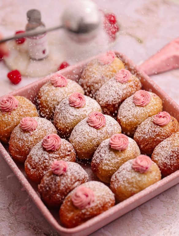 Raspberry Filled Cake Donuts with a Powdered Sugar Dusting