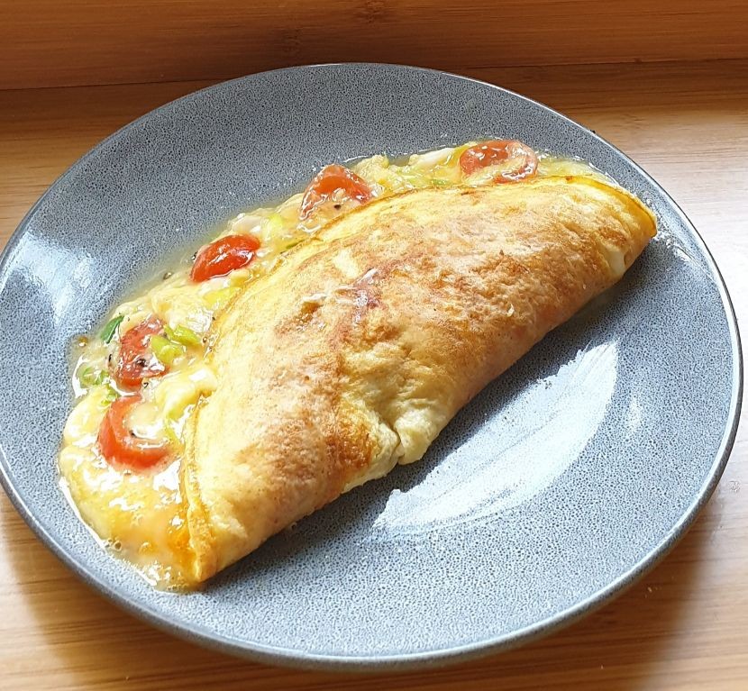 Simple cheese and tomato omelette