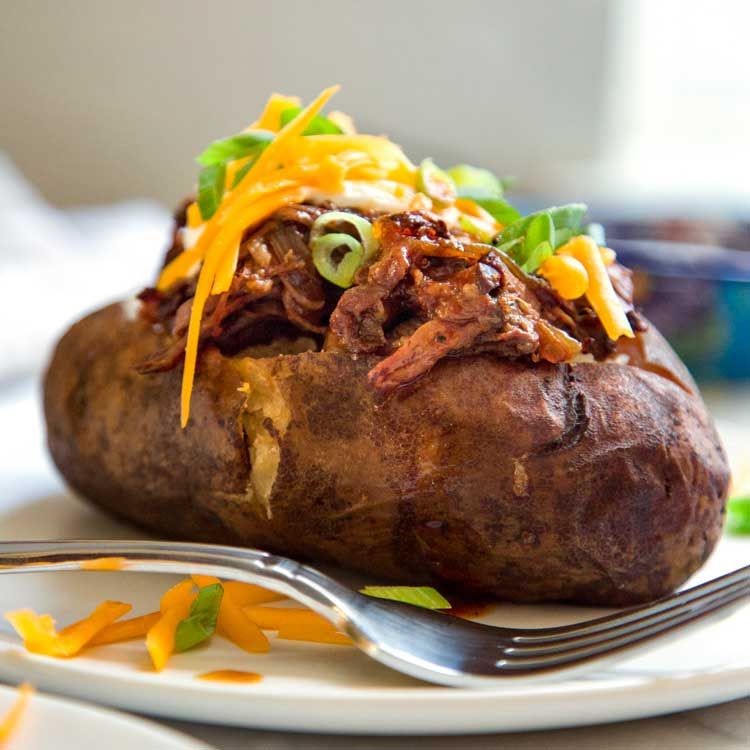 Smoked Chuck Roast Loaded Baked Potatoes
