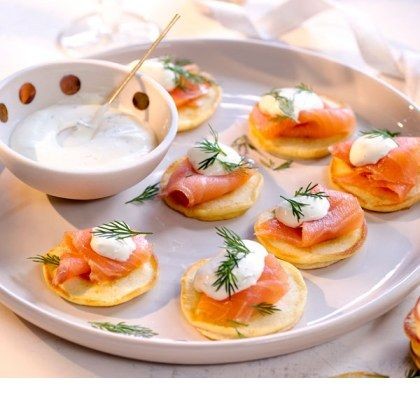 Smoked salmon blinis with crème fraîche and dill
