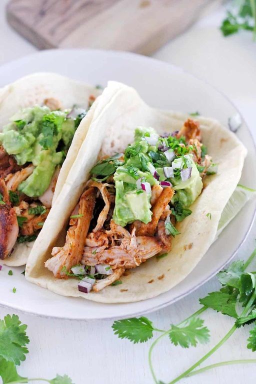 Smoky Mexican Chicken Thighs with Avocado Crema