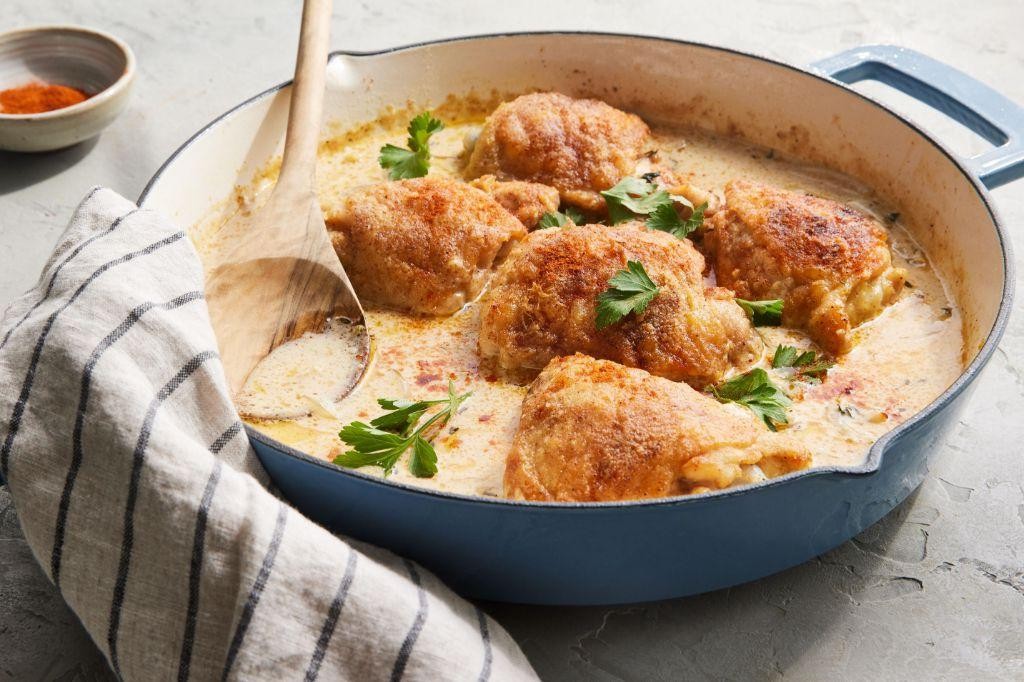 Smothered Chicken Thighs in Creamy Alfredo Sauce