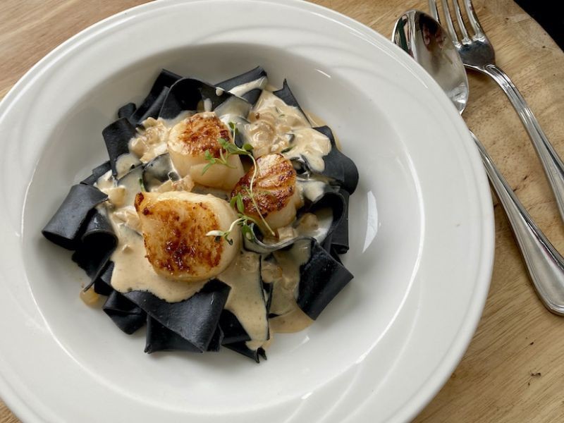 Squid Ink Fettuccine with Scallops and Cream Sauce