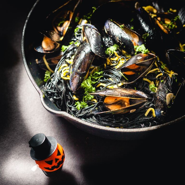 Squid Ink Tagliatelle with Clams and Saffron