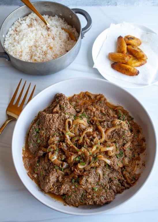 Bistec Encebollado (Puerto Rican Steak and Onions with Pork Chops)