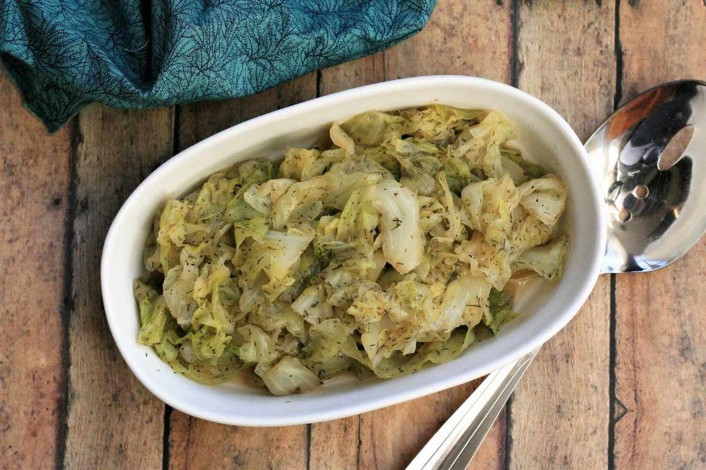 Boiled cabbage with lemon and dill