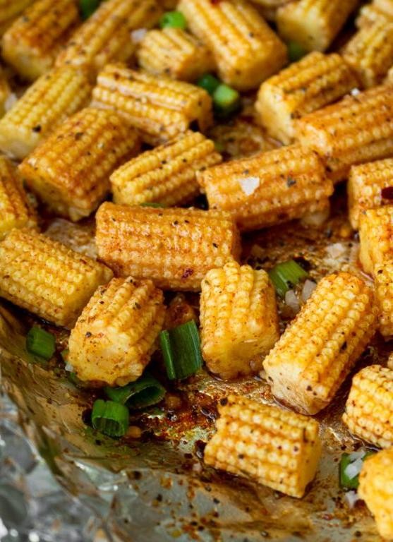 Cheesy baby corn bake with herbs