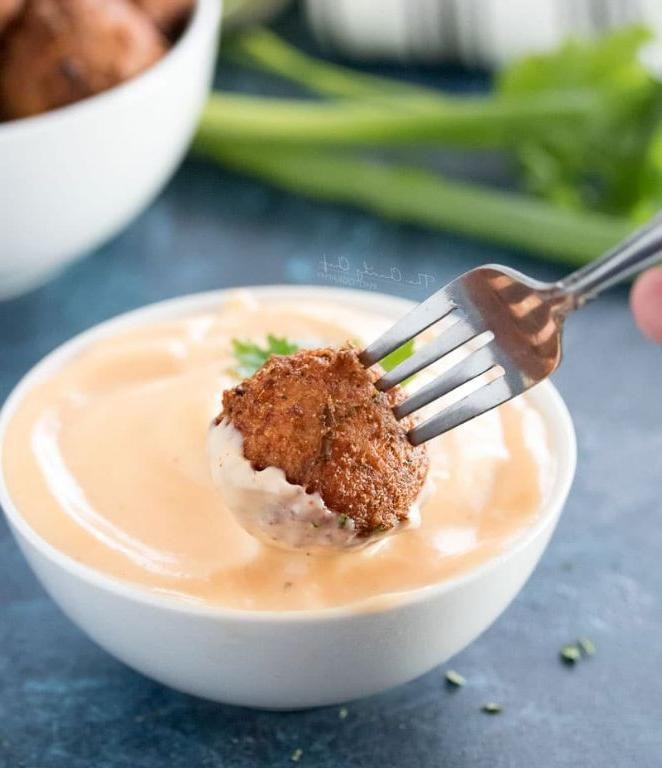 Crispy baby corn fritters with spicy dipping sauce