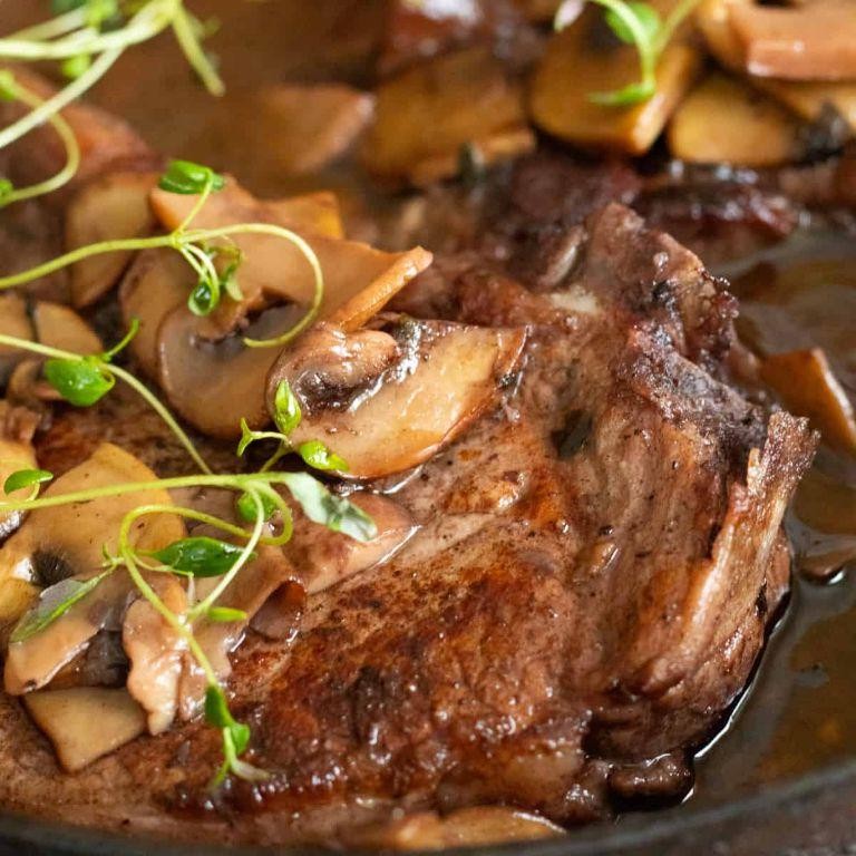Crock Pot Pork Steaks with Red Wine and Herbs