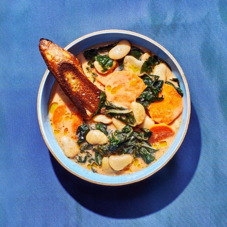 Dried Fava Bean and Kale Stew with Coconut Milk