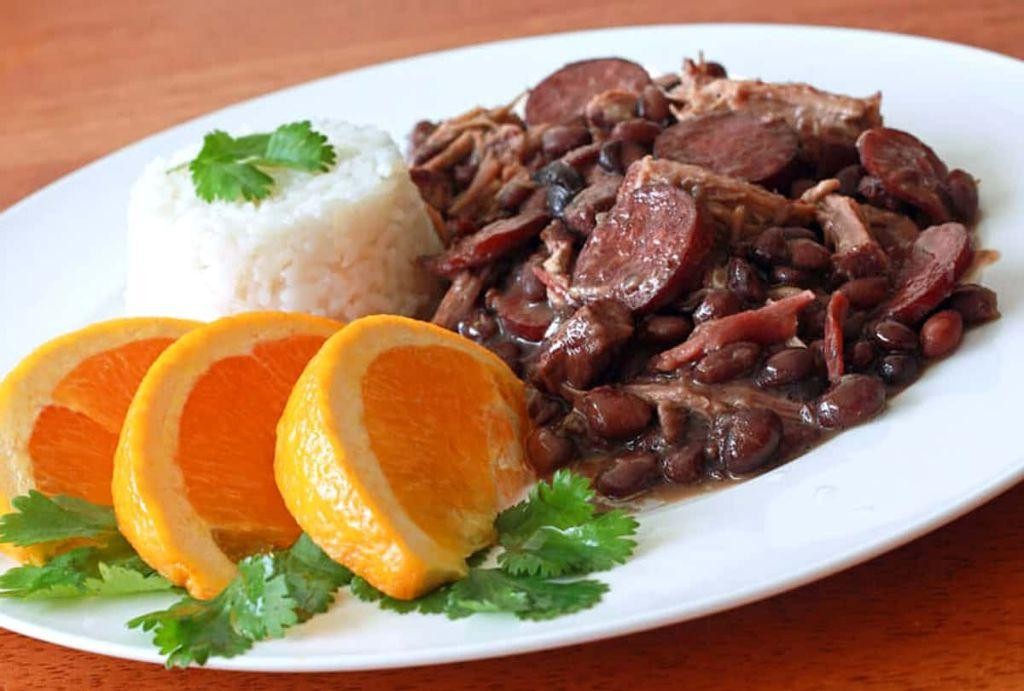 Feijoada with Fried Bananas and Hot Sauce
