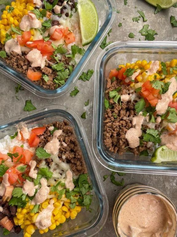 Meal-prep black bean burrito bowls in Tupperware
