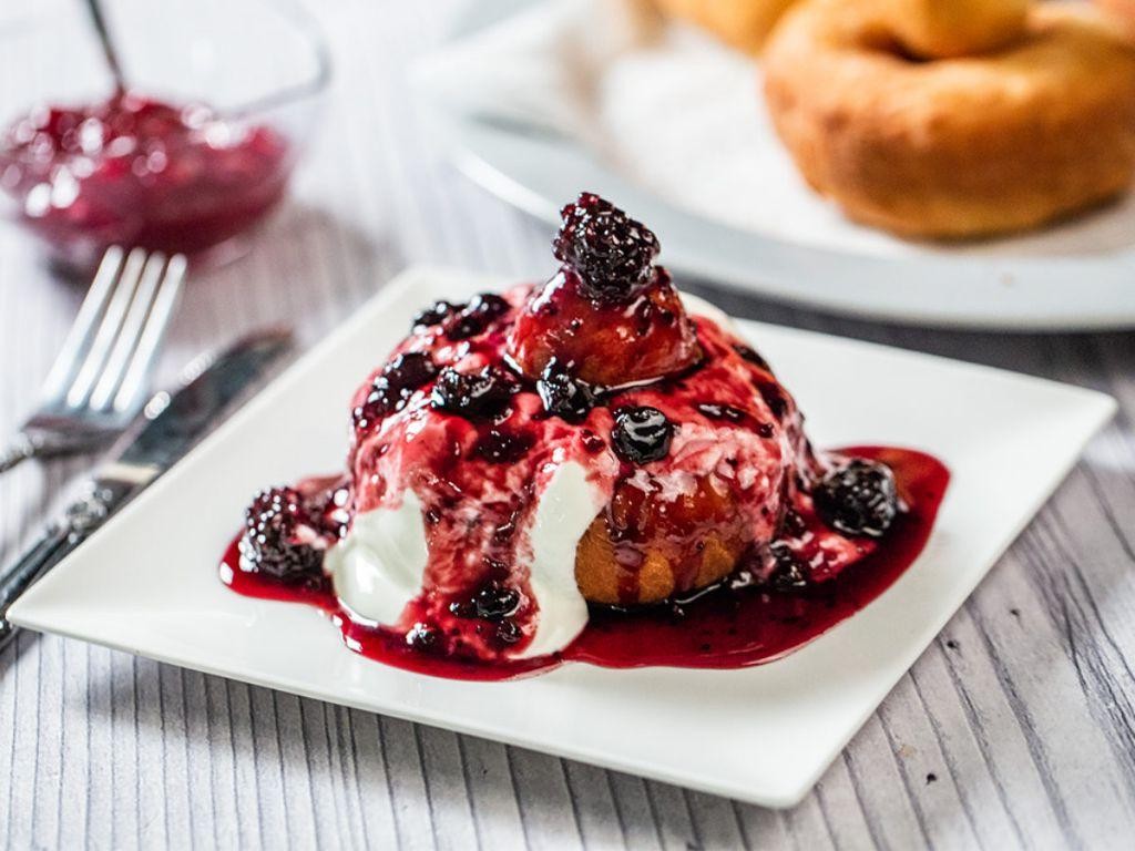 Papanași (Romanian Doughnuts with Sour Cream and Jam)