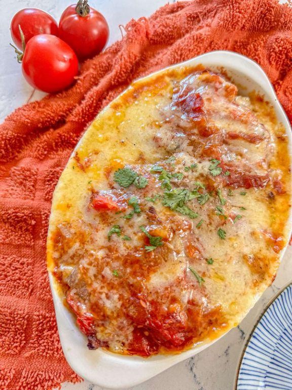 Pork Chop and Rice Stuffed Tomatoes