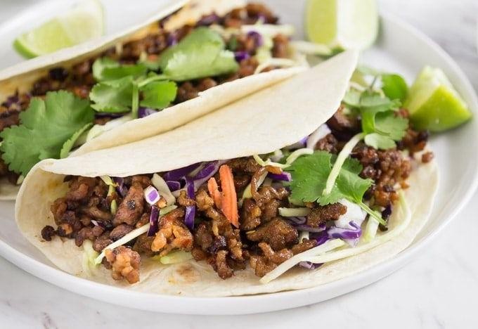 Pork and Sauerkraut Tacos with Spicy Slaw