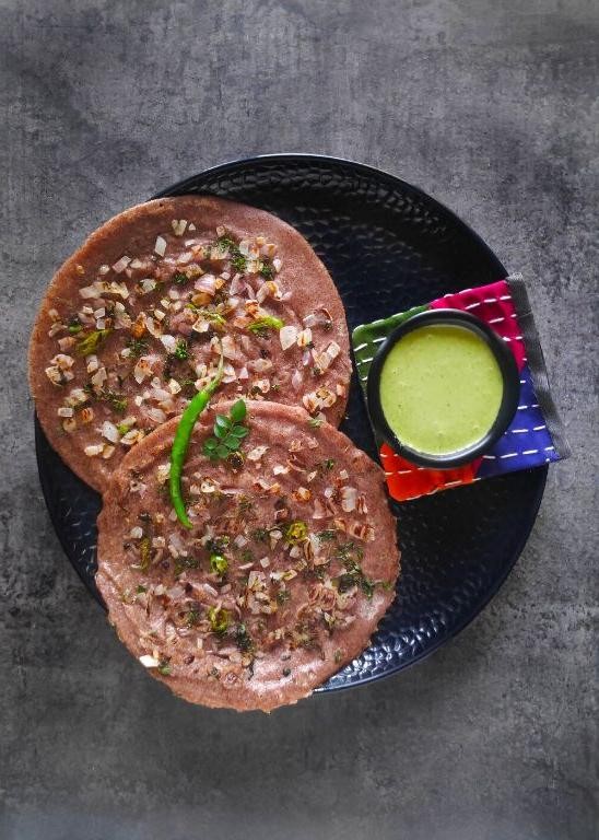 Ragi Flour Uttapam with Onion and Tomatoes