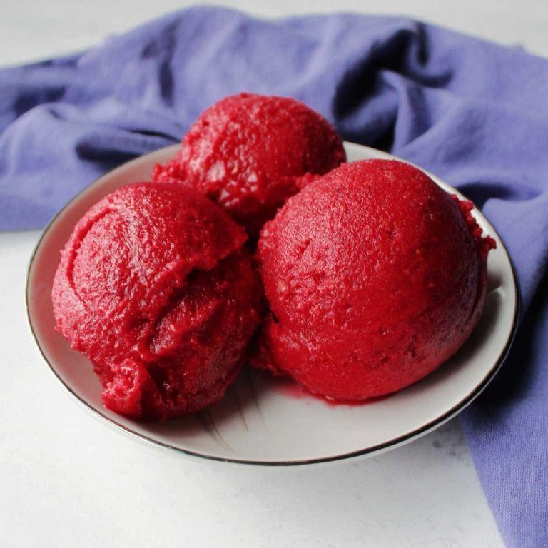 Raspberry sorbet with honey drizzle
