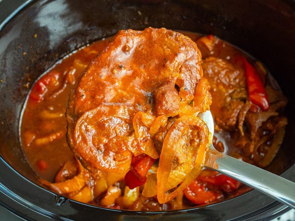 Slow Cooker Pork Steaks with Peppers and Onions