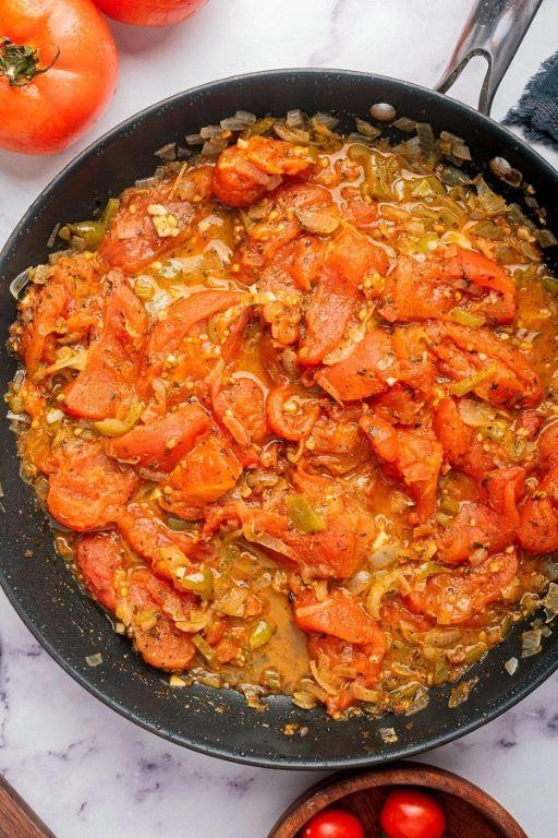 Slow-cooked stewed tomatoes with onions and thyme