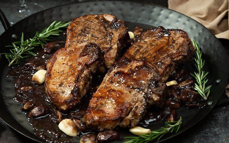 Thick Bone-In Pork Chops with Red Wine Reduction