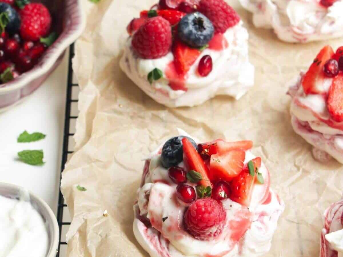 Mini Berry Ripple Cheesecake Pavlovas
